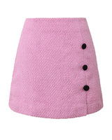 Mini-jupe bicolore rose et noir en tweed